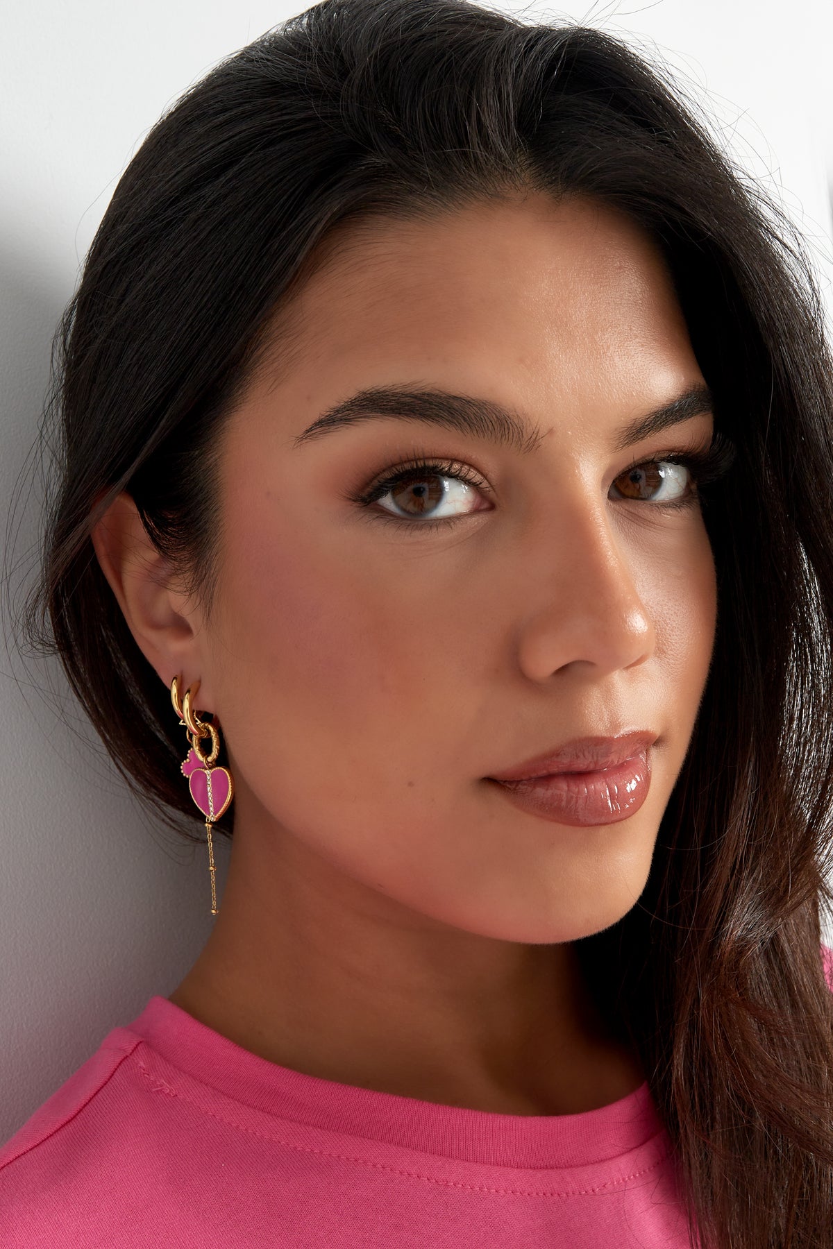 Oorbellen - Fuchsia roze hartjes met steentjes