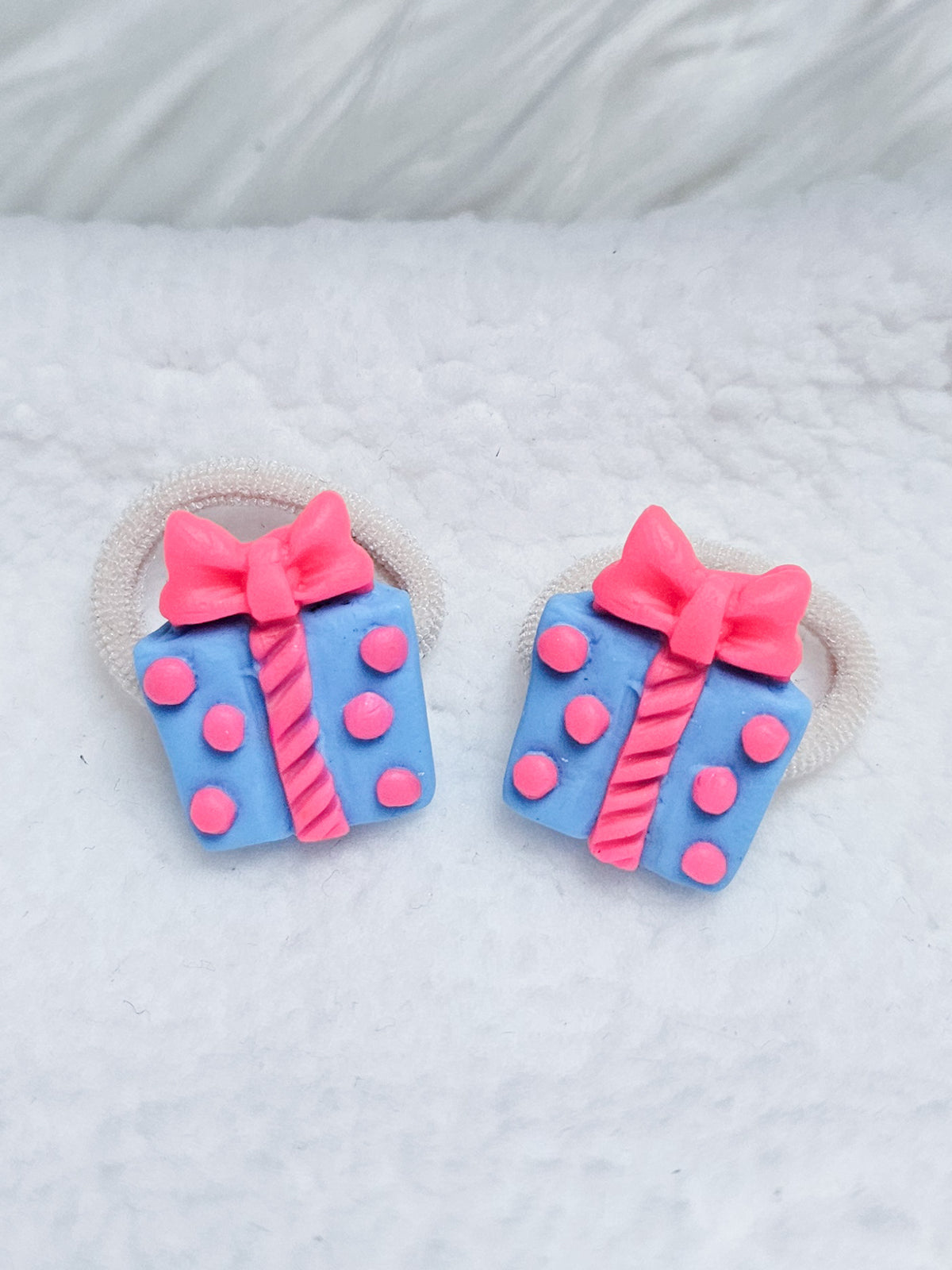 Mini of maxi elastiekjes - Pakjesavond roze/ blauw