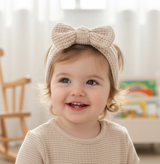 Gebreide haarband met strik - 𝑁𝑎𝑡𝑢𝑟𝑒 𝑠𝑎𝑛𝑑