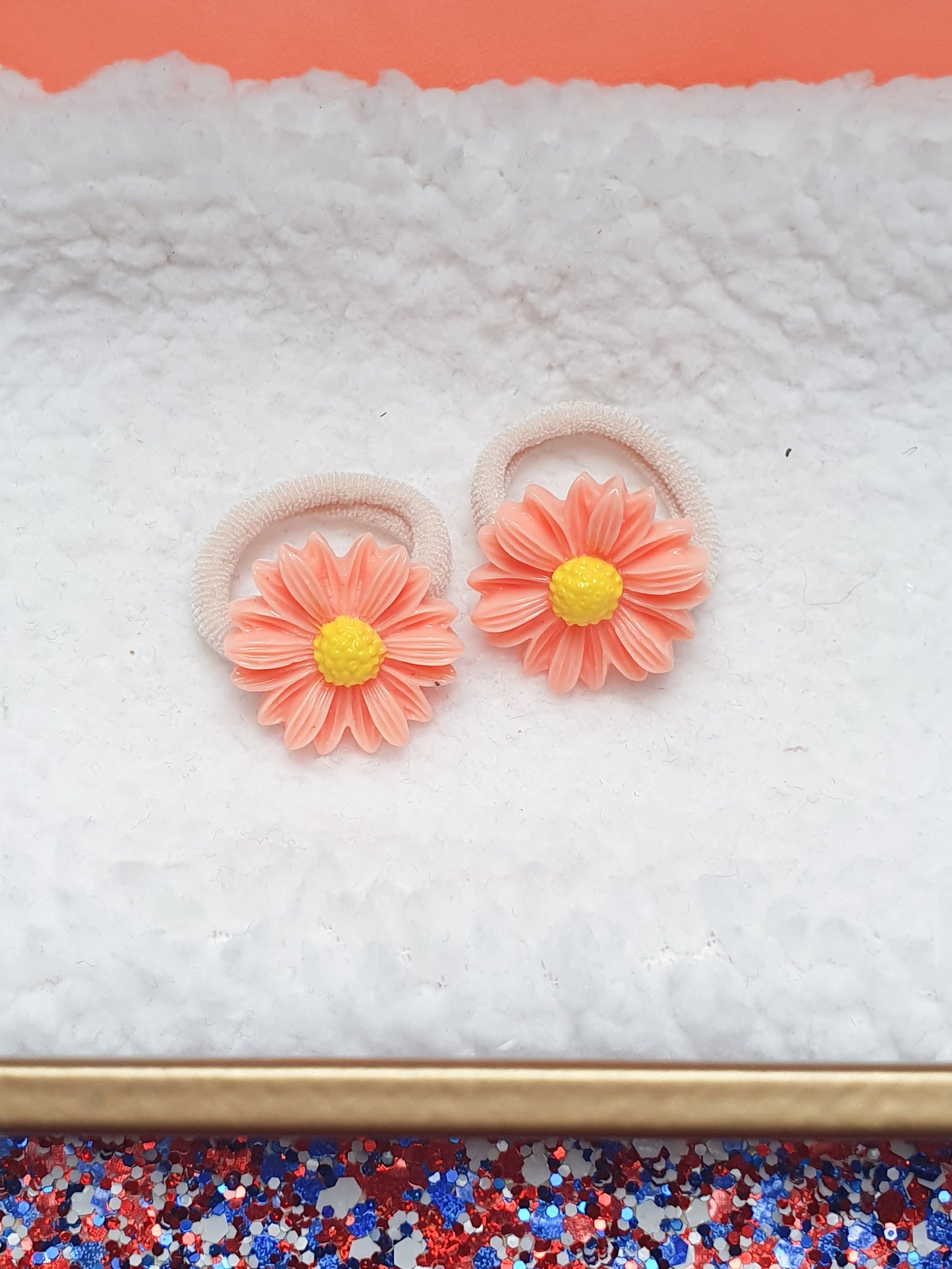 Elastiekjes Madelief oranje